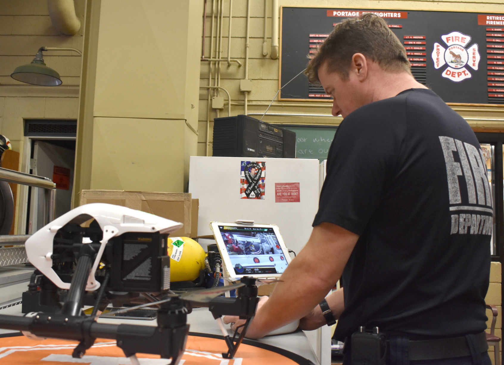 Matt Asch works on Portage Fire drone